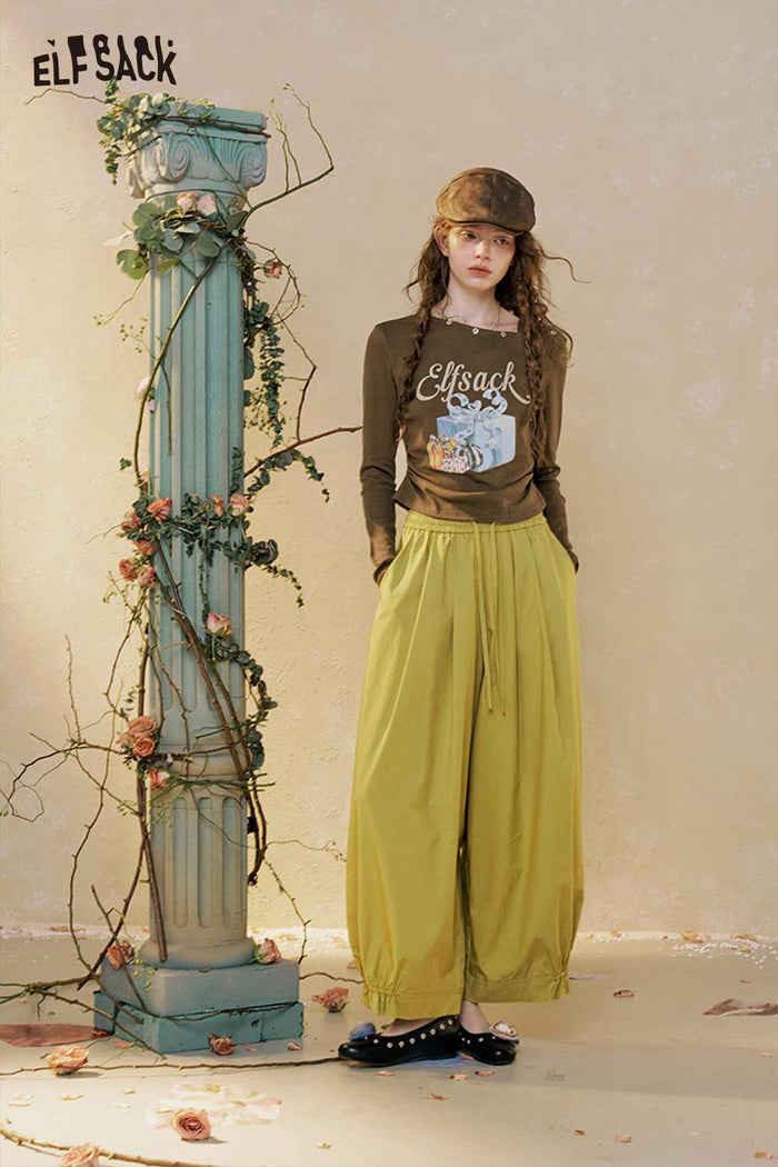 Graphic Long Sleeve Asymmetrical Neck Tee