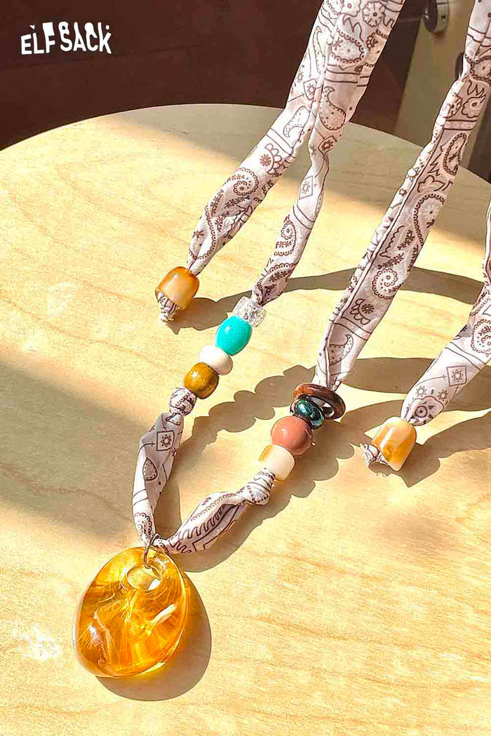 ELFSACK Ribbon Amber Resin Necklace