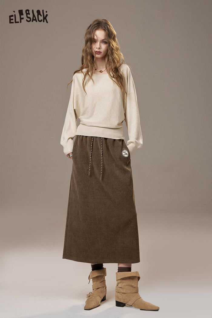 ELFSACK Soft Textured Weave Mid Rise Solid Color Versatile Midi Skirt